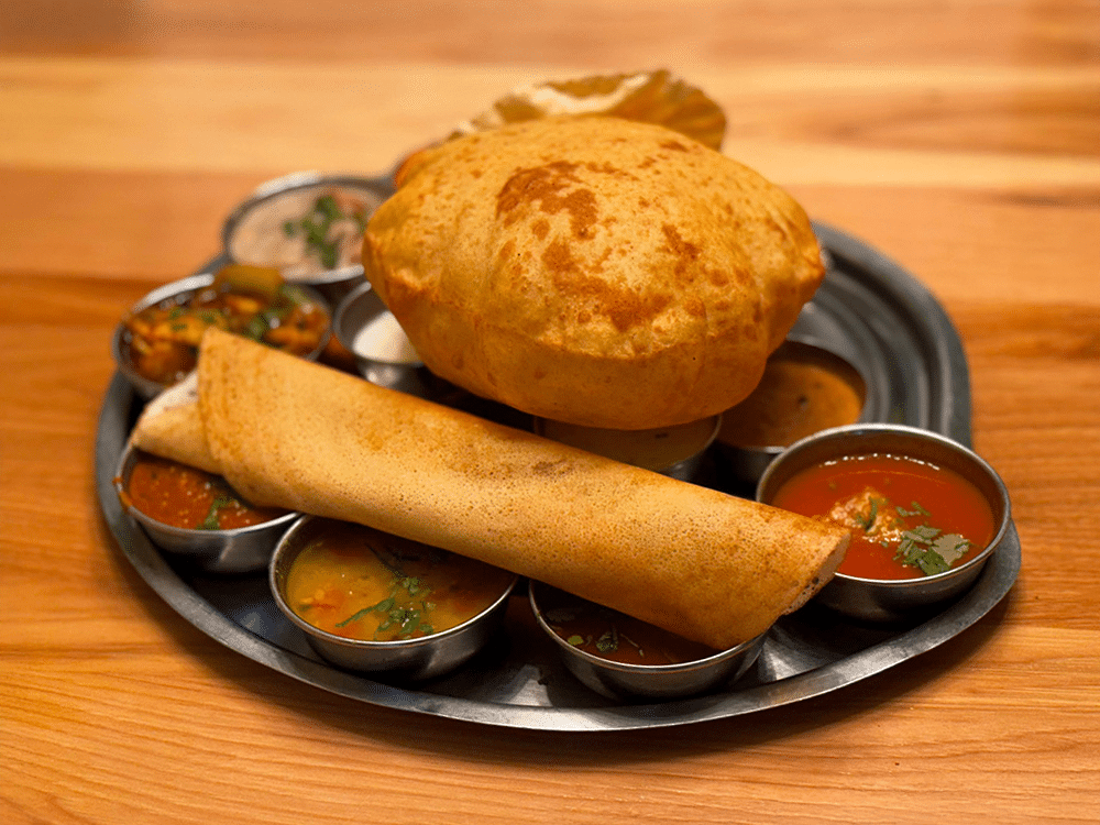 The Madras Cafe signature dishes Masala DosaChana BhaturaIdli